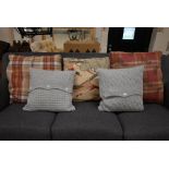 Five assorted cushions