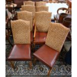 A set of eight oak framed high-backed dining chairs