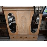 A stripped pine Edwardian wardrobe