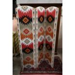 A triple panel folding dress screen