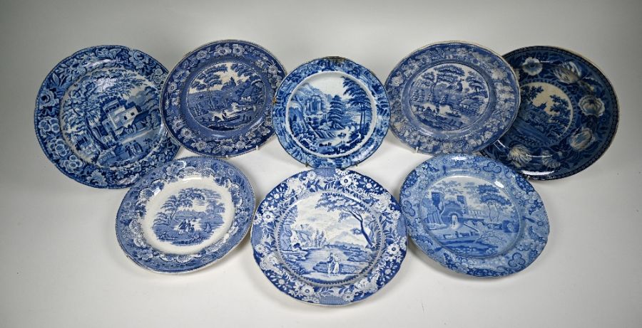 Fifty early 19th century blue and white pottery plates and dishes