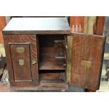 A Victorian oak smokers box cabinet