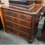 A small 19th century mahogany chest of four long drawers