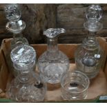 Three cut glass decanters and stoppers