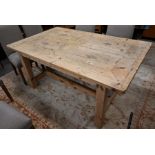 A pine farmhouse kitchen dining table