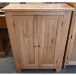 A modern light oak cabinet