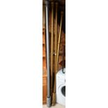 Assorted giltwood curtain poles, rings and a silvered pole (5)