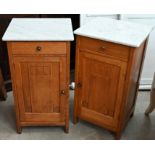 A pair of early 20th century German Arts & Crafts light oak bedside cabinets