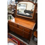 An early 20th century oak mirror back dressing chest