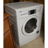 A Beko ECOWMB81445 8kg washing machine