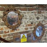 A pair of 19th century Black Forest wall mirrors