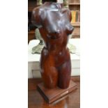 Carved wood female nude torso