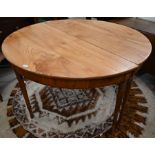 A pair of late 19th century elm demi-line console tables