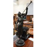 Bronzed spelter figure of a female trumpeter