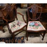 A set of eight mahogany Hepplewhite style shield back dining chairs