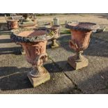 A pair of large weathered cast terracotta campana form garden urns (2)