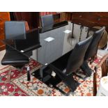 Contemporary black glass and chrome dining set