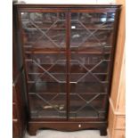 A 19th century mahogany astragal glazed bookcase on stand