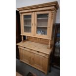 A Continental pine part-glazed dresser