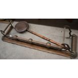 Two fenders, copper warming pans, fire tools