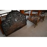 Fire dogs, basket and armorial cast iron fire back