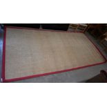 A large woven sisal carpet