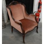 A carved mahogany salon armchair