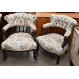 A pair of floral upholstered bedroom chairs