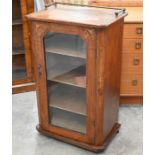 A Victorian walnut and satin inlaid music cabinet