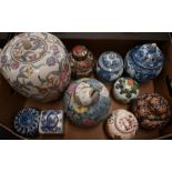 Ten various Asian and other ceramic storage jars and covers