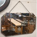 A 1950s octagonal wall mirror