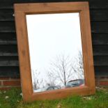 A modern oak framed mirror