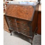 A Queen Anne style walnut bureau