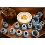 Nine Victorian blue-glazed patum pots with gilt-printed decoration