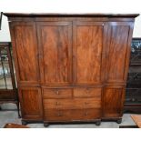 A 19th century mahogany breakfront wardrobe