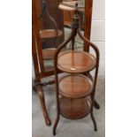 A Regency mahogany inlaid three tier cake stand