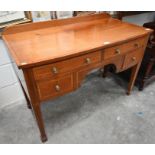 A Victorian mahogany crossbanded kneehole dressing table