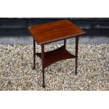 An Edwardian walnut inlaid two-tier side table