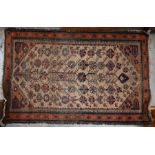 An antique Persian Baluchi rug