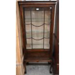 A mahogany astragal glazed display cabinet