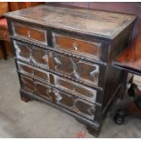 An oak Jacobean style chest of drawers