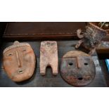 Four Colombian terracotta figures and masks