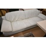 A large contemporary egg-shell leather three seater sofa