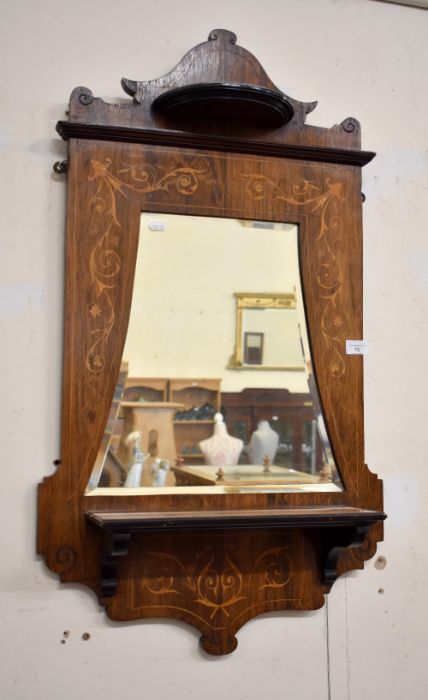 An Edwardian bevelled wall mirror