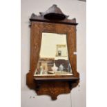 An Edwardian bevelled wall mirror