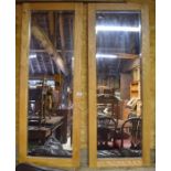 Two beech framed rectangular wall mirrors