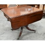 A Victorian mahogany drop leaf table