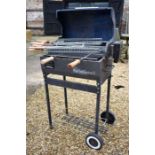 A Barbeskew II Hands Free BBQ (blue)