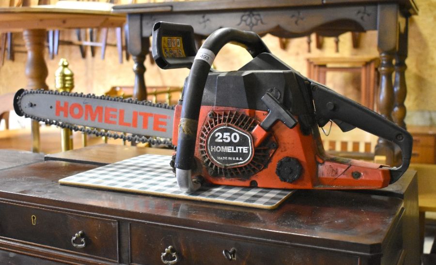 A Homelite 250 18 inch petrol chainsaw