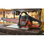 A Homelite 250 18 inch petrol chainsaw